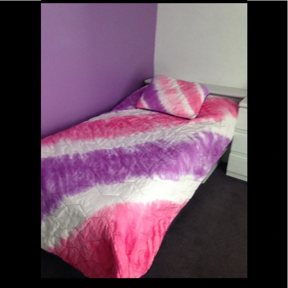 XL twin quilt with matching sham cover. Purple, pink and white